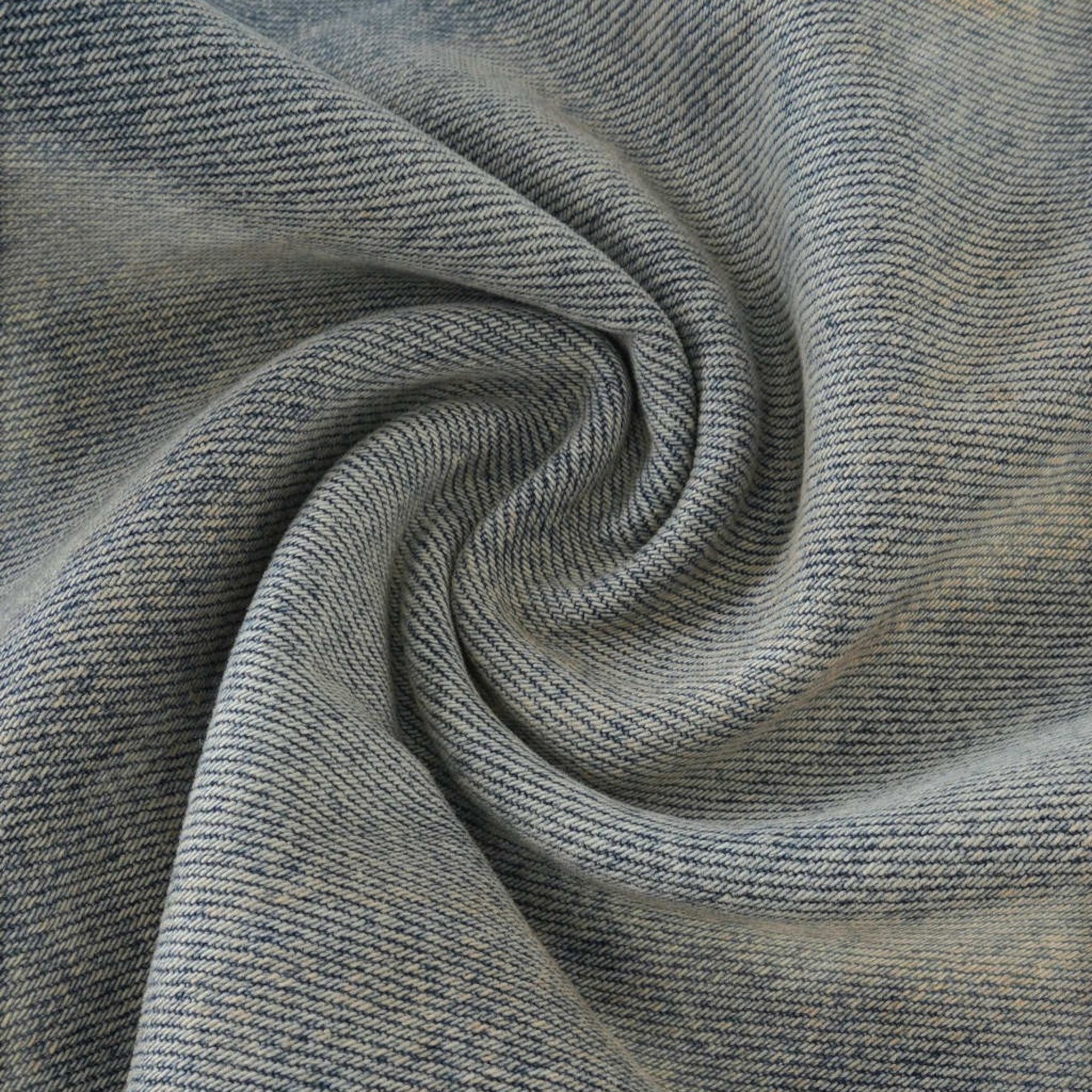 Rux Distressed Barrel Leg Jeans Studio Ruban — detail shot of fabric