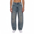 Rux Distressed Barrel Leg Jeans Studio Ruban — front view