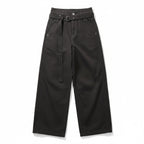 Studio Ruban black wide-leg slacks with a matching belt and buckle, featuring a cleanfit straight-leg design.