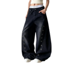 Studio Ruban dark washed wide-leg jeans with silver stud detailing down the sides. Relaxed fit.