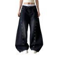 Studio Ruban dark washed wide-leg jeans with silver grommet detailing down the sides.