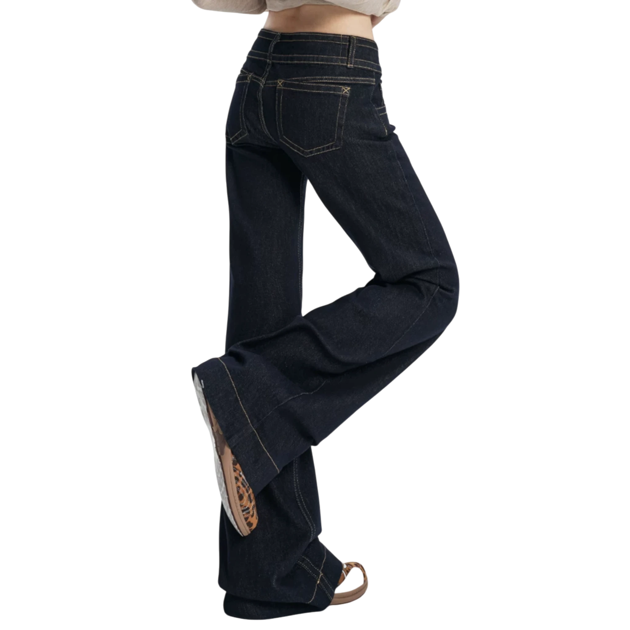 Studio Ruban Gigi dark wash denim wide leg jeans with golden stitching and high waist.