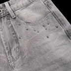Studio Ruban grey denim wide-leg jeans with distressed details and star embellishments