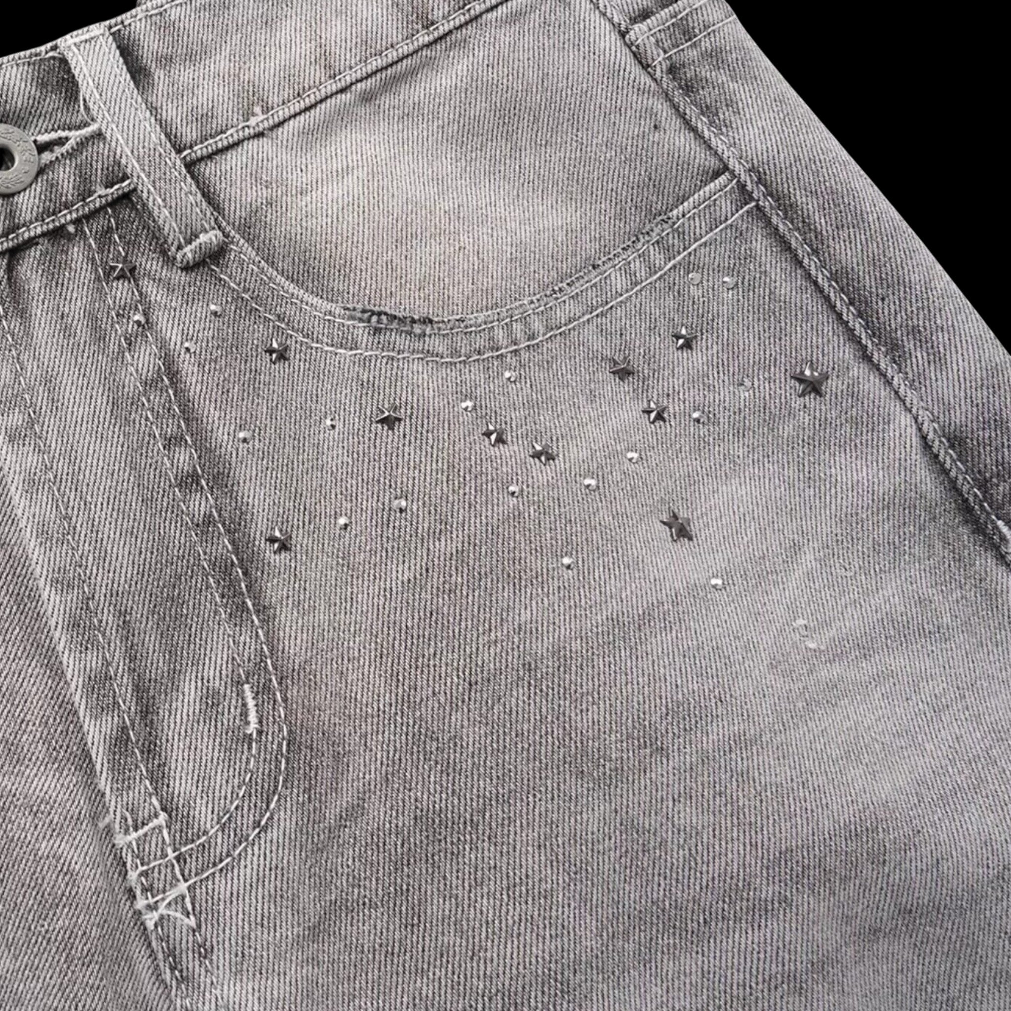 Studio Ruban grey denim wide-leg jeans with distressed details and star embellishments
