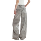 Studio Ruban women's grey distressed wide-leg jeans with star embellishments and high waist.