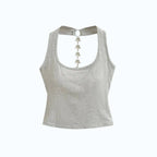 Studio Ruban grey sleeveless tank top with a chain of star charms connecting the back of the neckline.