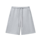 Studio Ruban Essential Heavyweight Fleece Shorts in light grey, made from a cotton blend with a drawstring and pockets.