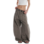 Studio Ruban Kisa taupe wide leg denim jeans with square stud embellishments and a relaxed fit.