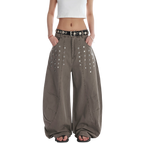 Studio Ruban Kisa taupe wide leg denim jeans with square stud embellishments and a relaxed fit.