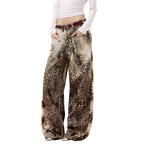 Studio Ruban Leo wide leg jeans in leopard print denim with a washed-out effect and a dark red belt.