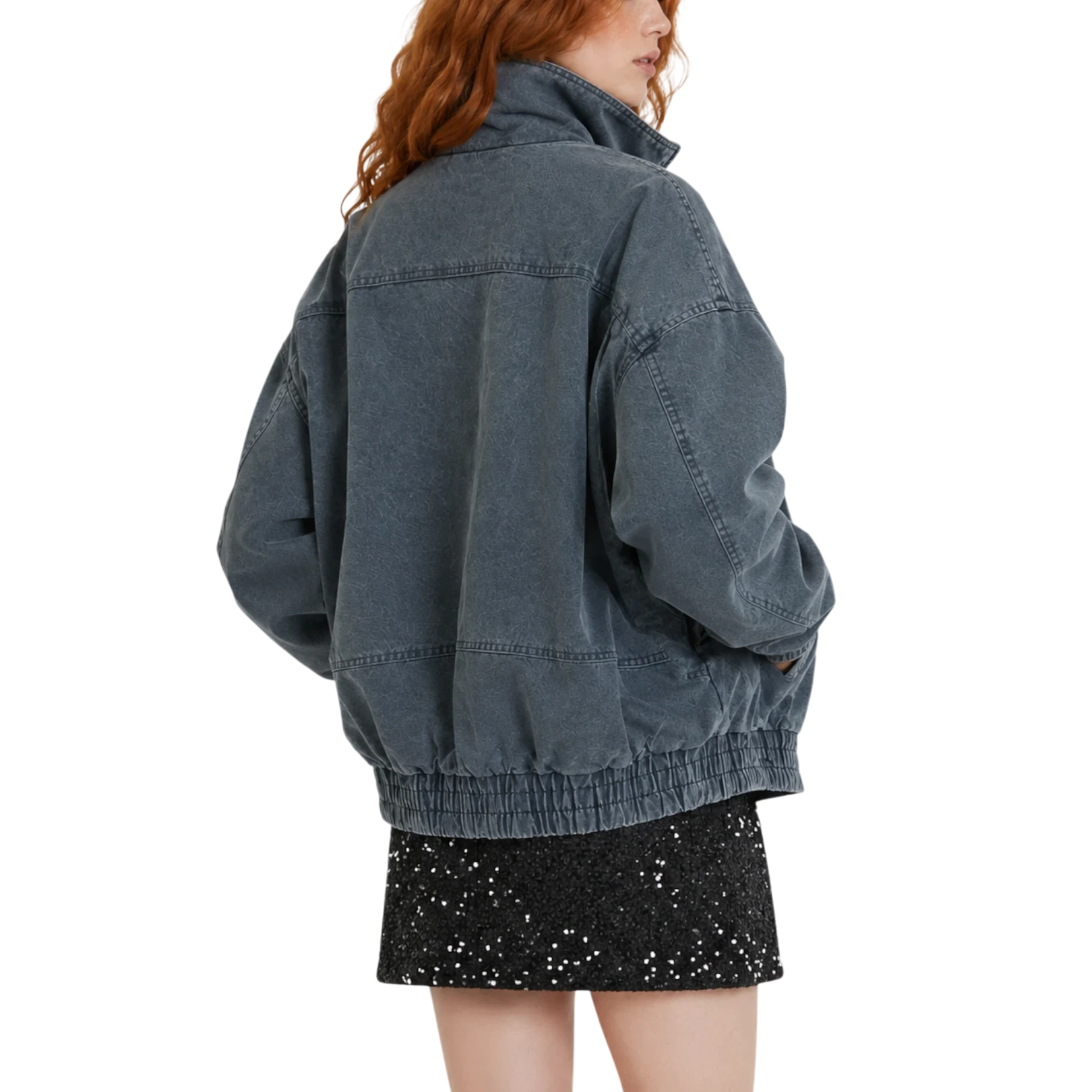 Studio Ruban charcoal grey oversized denim bomber jacket with toggle closures and stand-up collar on a model.