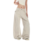 Studio Ruban Risa wide leg cargo pants in stone cotton blend with studded belt and utility pockets.