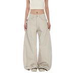 Studio Ruban Risa stone wide leg cargo pants with studded belt and exaggerated silhouette. Cotton blend.