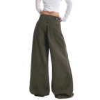 Studio Ruban Tiri olive green wide leg wrap pants with button closure and exaggerated flare.