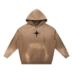 Studio Ruban vintage washed frayed fleece hoodie in tan with a black star graphic and paint splatter details.