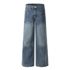 Studio Ruban Viola mid-wash denim wide leg jeans with rhinestone embellishments on pockets and legs.