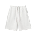 Studio Ruban white heavyweight fleece shorts with drawstring and pockets. Cotton blend fabric.