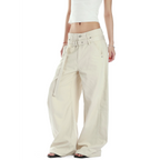 Studio Ruban Evi cream wide-leg slacks with belt. Women's versatile cleanfit straight-leg pants.